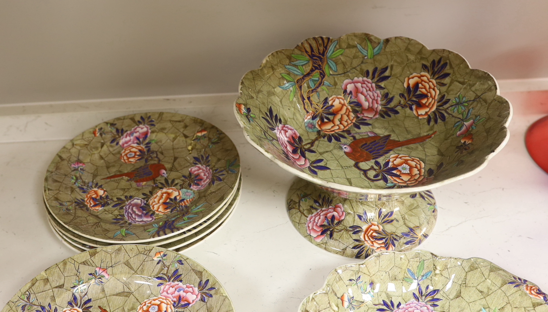 A Spode ‘Tumbledown Dick’ part dessert service, early 19th century, decorated with birds and flowers